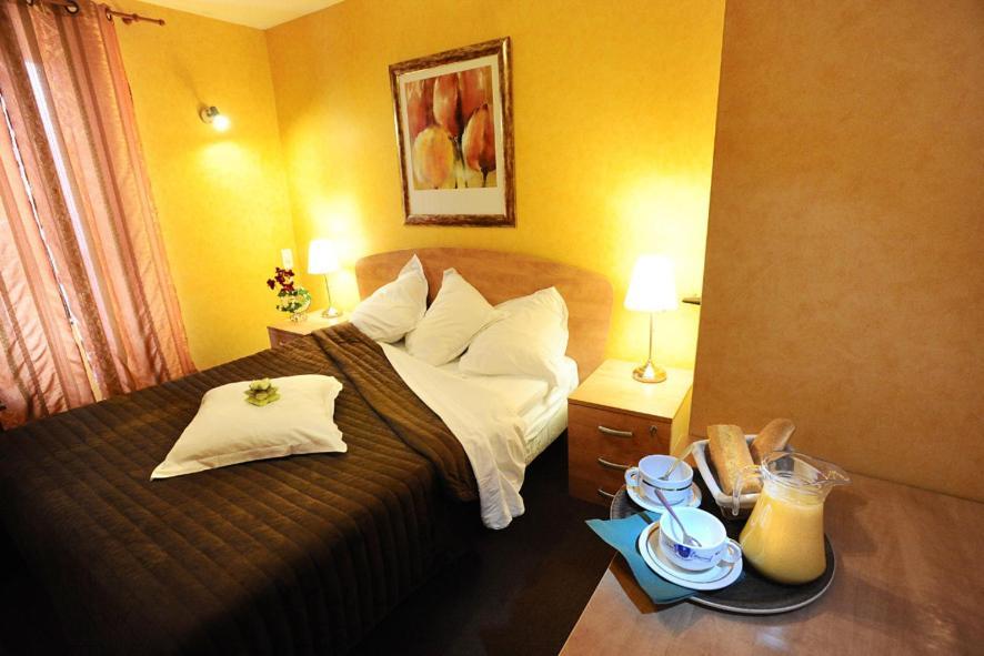 Les Negociants Otel Pontgibaud Oda fotoğraf